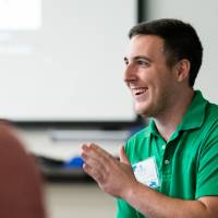 Jared Moore talks with students